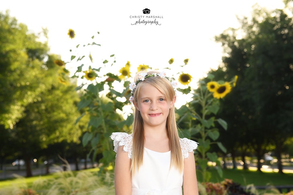 girl, baptism, LDS, by LDS Temple, in front of sunflowers