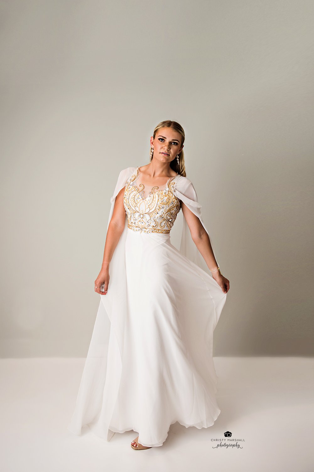 Young women in formal white dress