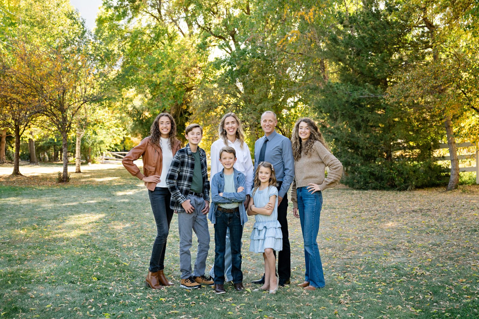 Family Picture in a park with fall leaves