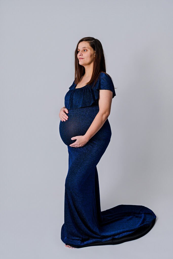 Utah Maternity Photography -pregnant women in long dark blue sparkly dress